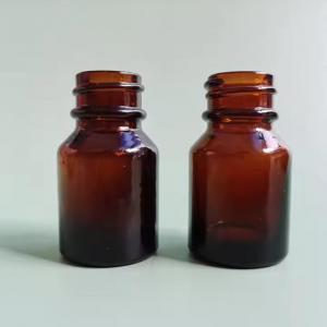 10ml amber essential oil glass bottle with ribbed black Phenolic cap